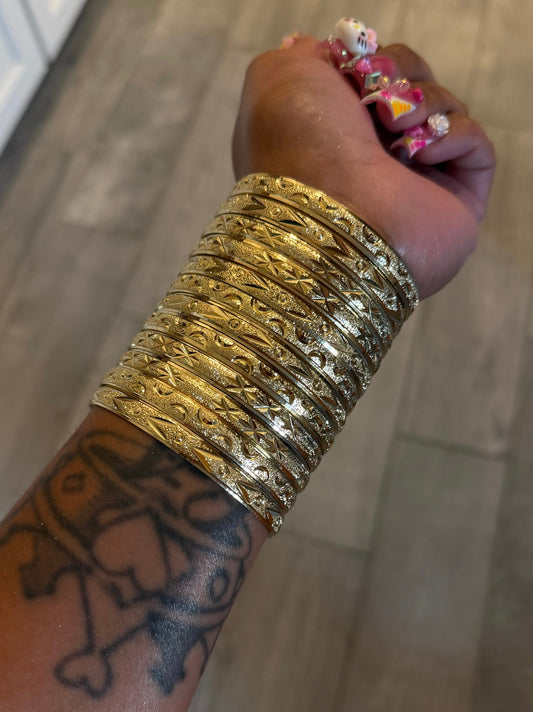 GOLD BANGLES STACK