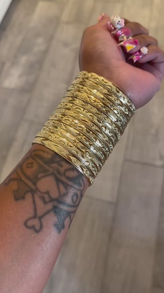 GOLD BANGLES STACK